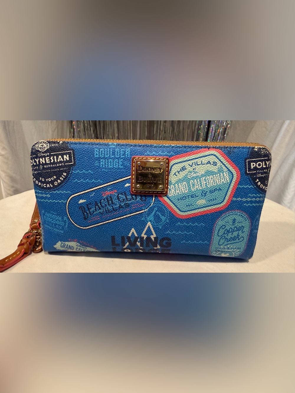 Dooney & Bourke Blue Disney Vacation Club Wristlet with Gold Plaque